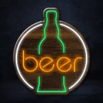 Beer Bottle LED Neon Sign, with a glowing amber-colored liquid inside and a frothy white top. The sign is mounted on a black background and emits a warm and inviting light