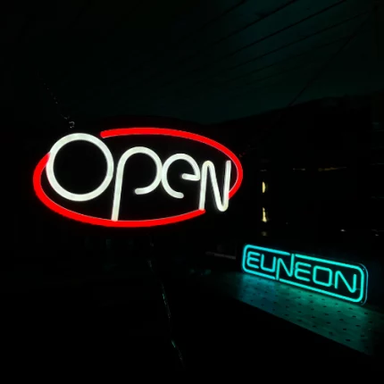 Open LED neon sign in red and white oval design for businesses